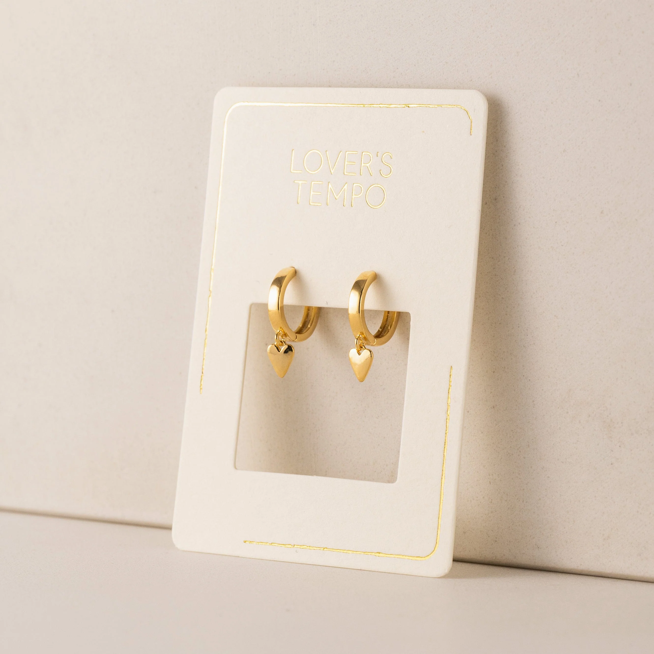 GOLD EVERLY HEART HUGGIE HOOP EARRINGS by LOVER'S TEMPO