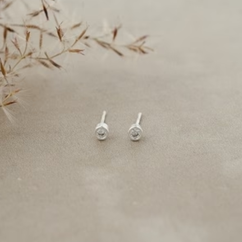 SILVER WINK STUDS by GLEE JEWELRY