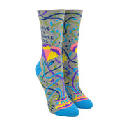 grey socks with multicolour squiggles and flowers and says i love my asshole kids