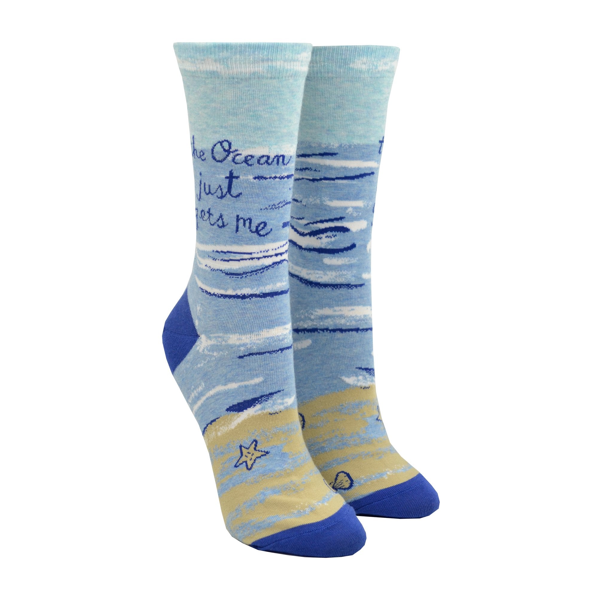 socks with ocean and sandy beach says the ocean just gets me