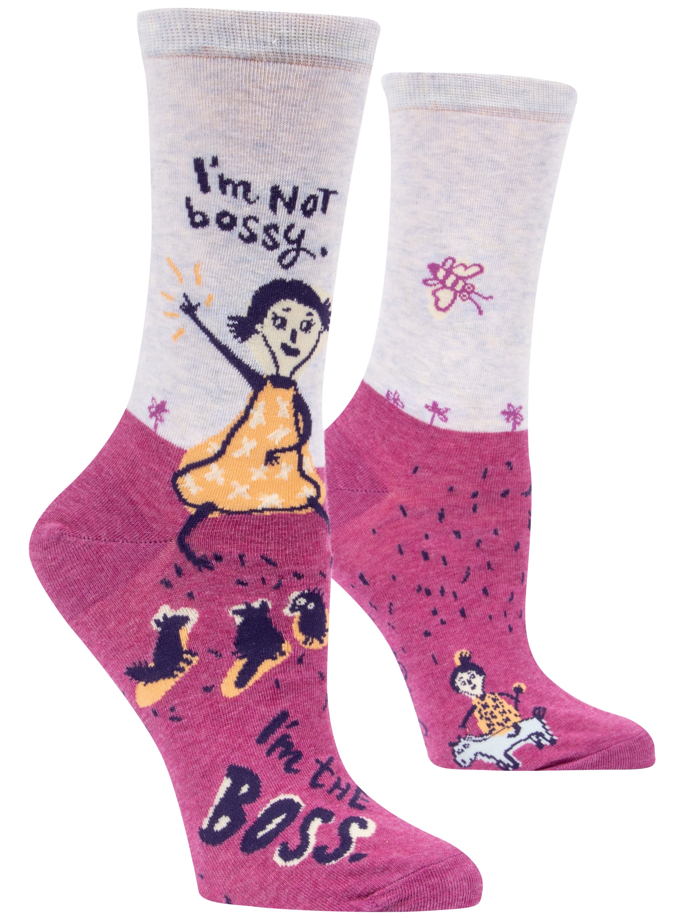 purple and pink socks with a cartoon of a girl with animals and it says i'm not bossy. i'm the boss