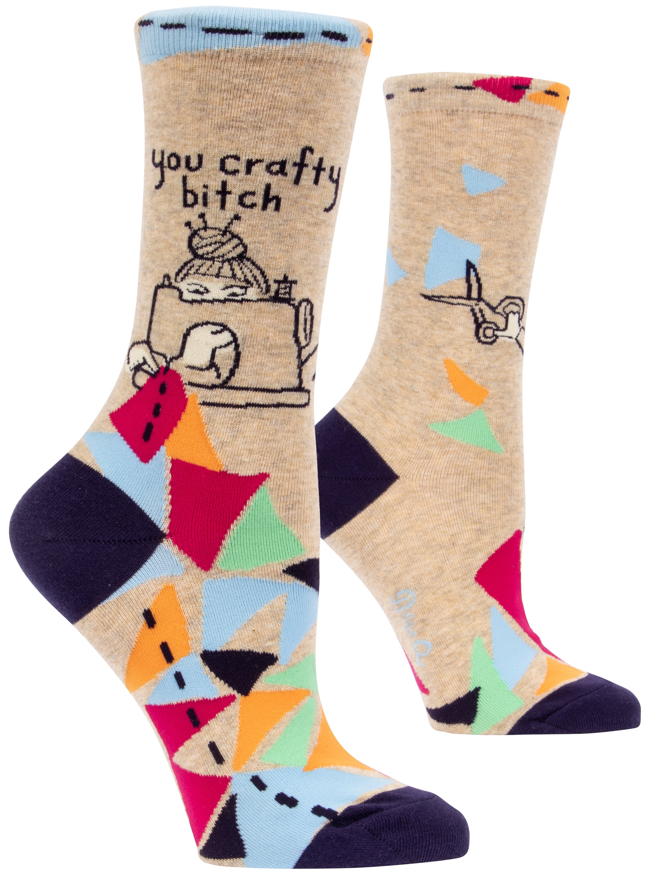 beige socks with multicolour shapes on foot with a cartoon of someone at sewing machine and above it says you crafty bitch