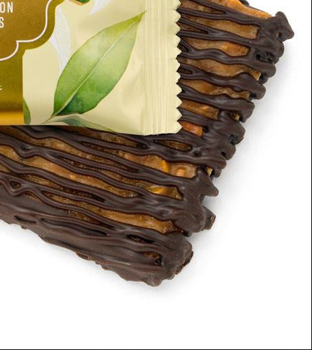 Packaged lemon pistachio brittle BAR with a visible ROGERS label on a white background