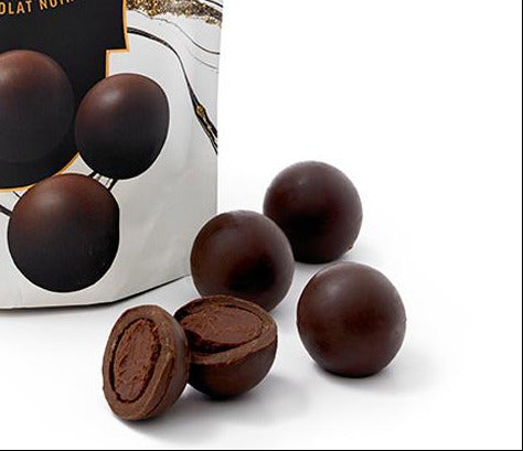 Packaging of Roger's Dark Chocolate Truffle Drops with truffles displayed on a white background