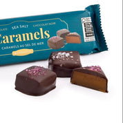 Packaged caramels with a blue wrapper on a white background