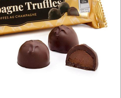 Packaged chocolate truffles with a visible Rogers' chocolates label on a white background