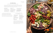 Assorted Italian meats, cheeses, and vegetables on a wooden board with recipe on the left side.