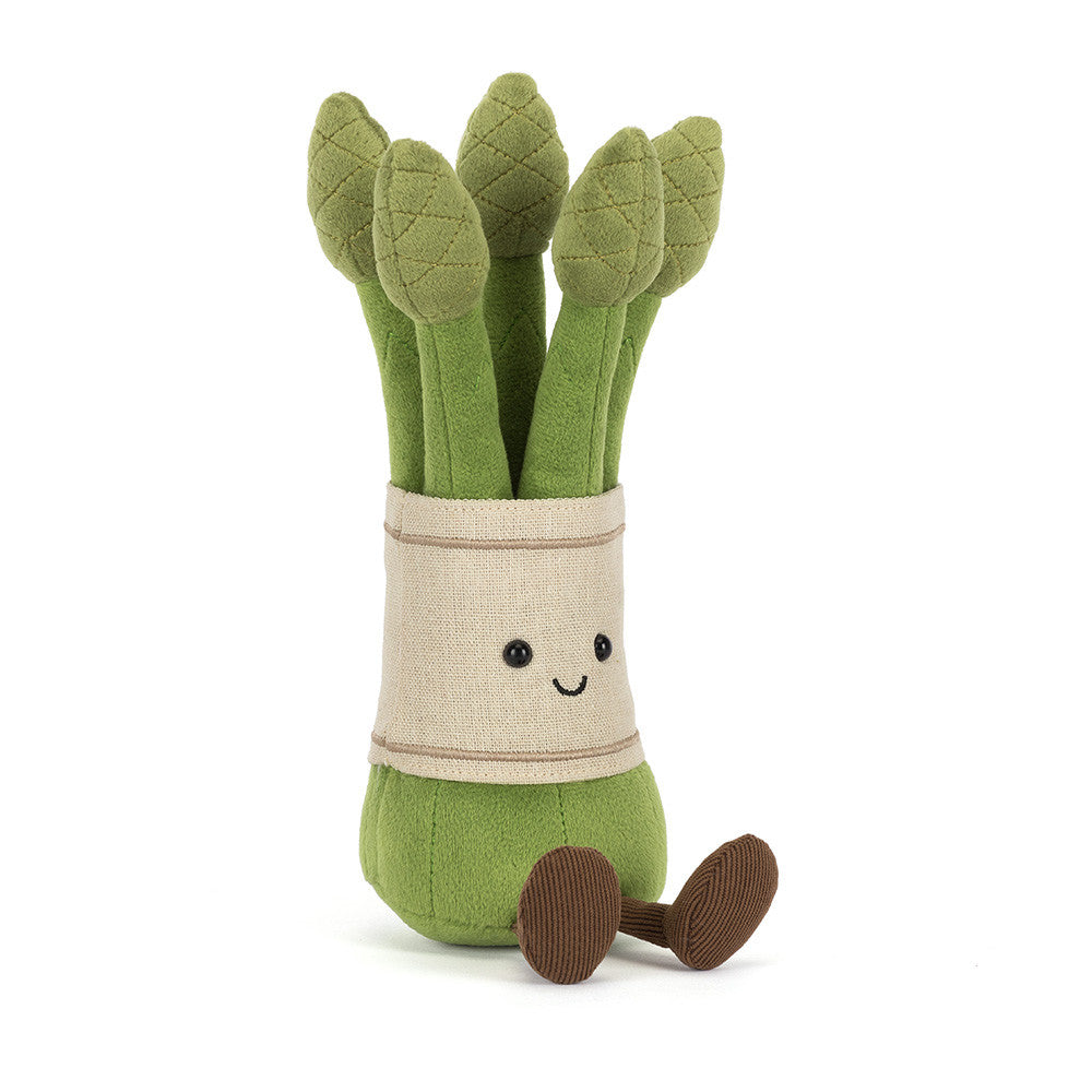 plush toy bundle of asparagus with light tan band and smiling face on white background