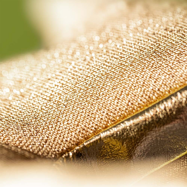 Close-up of a gold textured surface