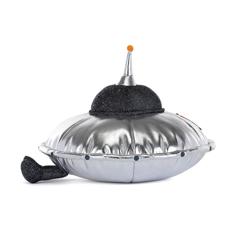 side view of shiny silver and sparkly black spaceship plush toy on white background 