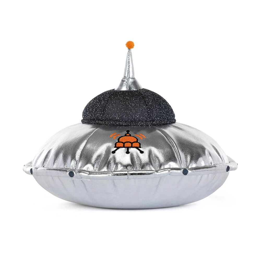 back view of shiny silver and sparkly black plush toy spaceship with orange stitched logo on white background
