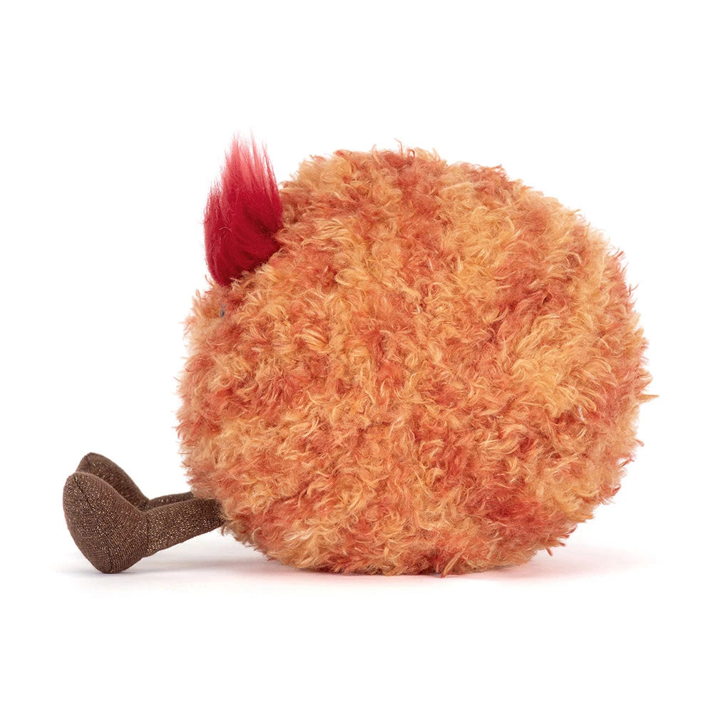 side view of plush toy mars planet with orange fur body, busy red tall eyebrows and brown boots on white baclground