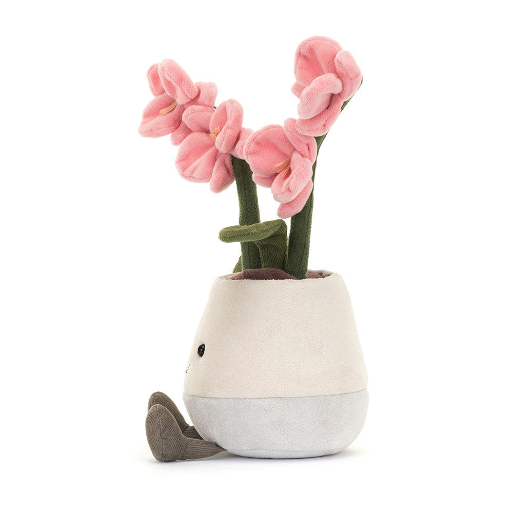 Plush jellycat toy flower in a pot with pink orchid flowers on a white background
