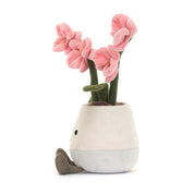 Plush jellycat toy flower in a pot with pink orchid flowers on a white background