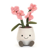 Plush jellycat toy flower in a pot with pink orchid flowers on a white background