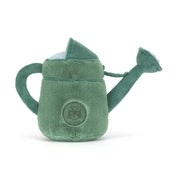 Plush toy green watering can with a smiling face on a white background