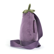 side view of Plush bum bag purse by jellycat shaped like an eggplant with a smiling face on a white background