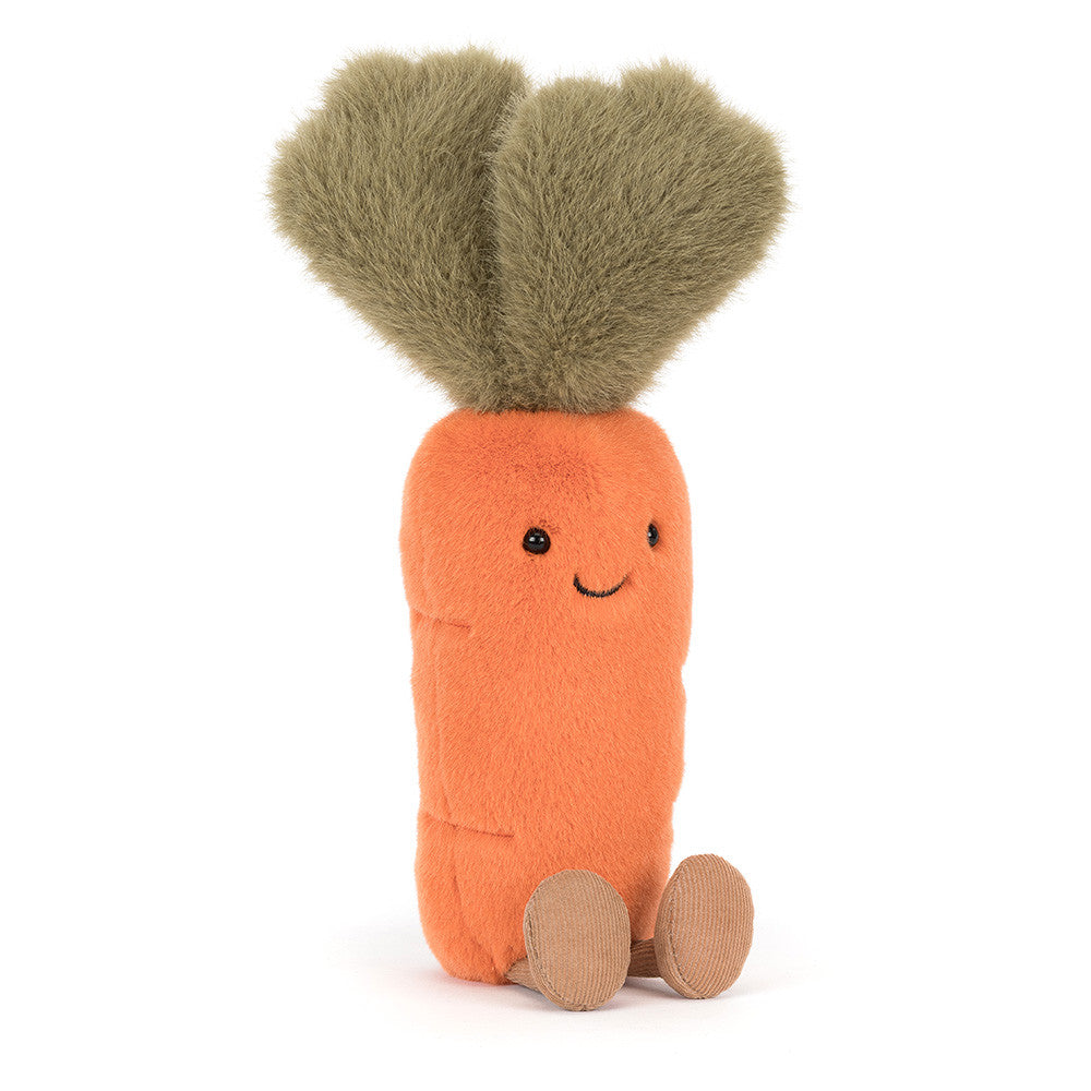 Stuffed toy plush carrot with a smiling face on a white background