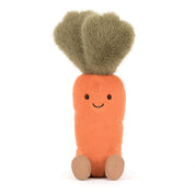 Plush carrot toy with a smiling face on a white background