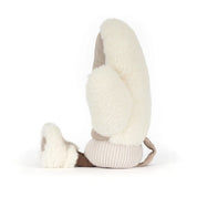 sideview of A plush winter mitten jellycat toy in a warm taupe-brown fabric with cream sherpa trim, featuring a simple embroidered smiley face and small feet, shown on a clean white background.