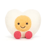 heart shaped boiled egg plush with smiling face on white background