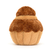 Jellycat plush toy resembling a brown and beige brioche pastry with a smiling face, corduroy legs, and a soft textured surface back view