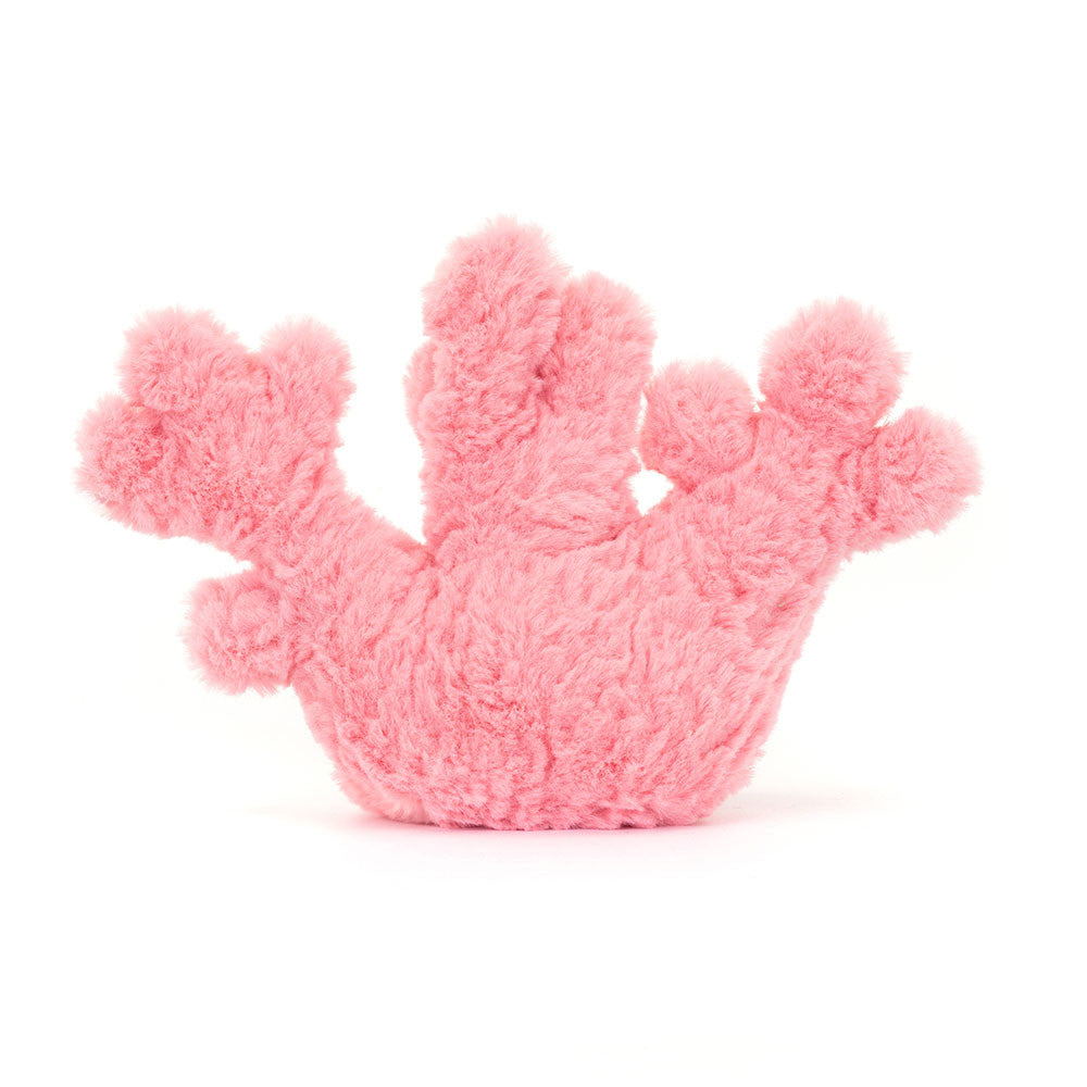 back view Pink jellycat plush coral toy with a smiling face on a white background