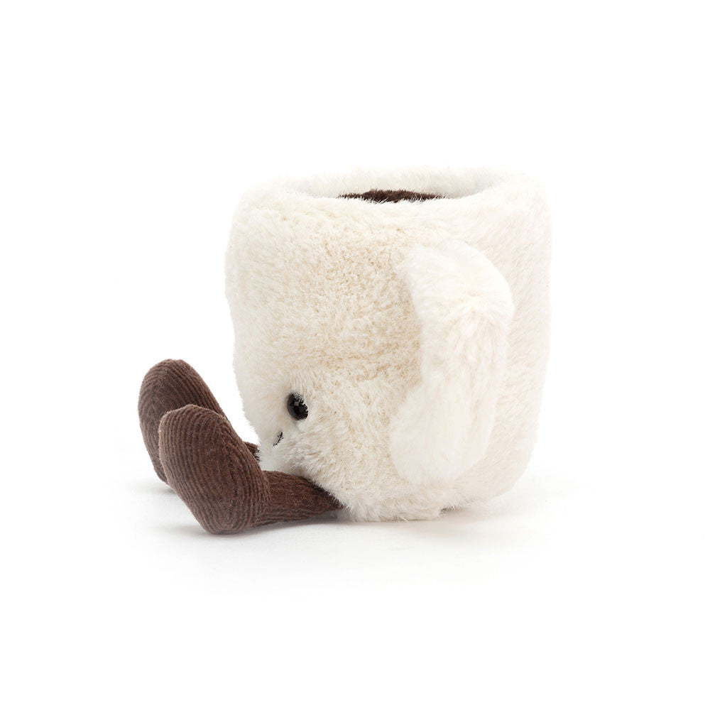 side view of small white espresso coffee cup jellycat stuffed plush toy with black smiley face by jellycat