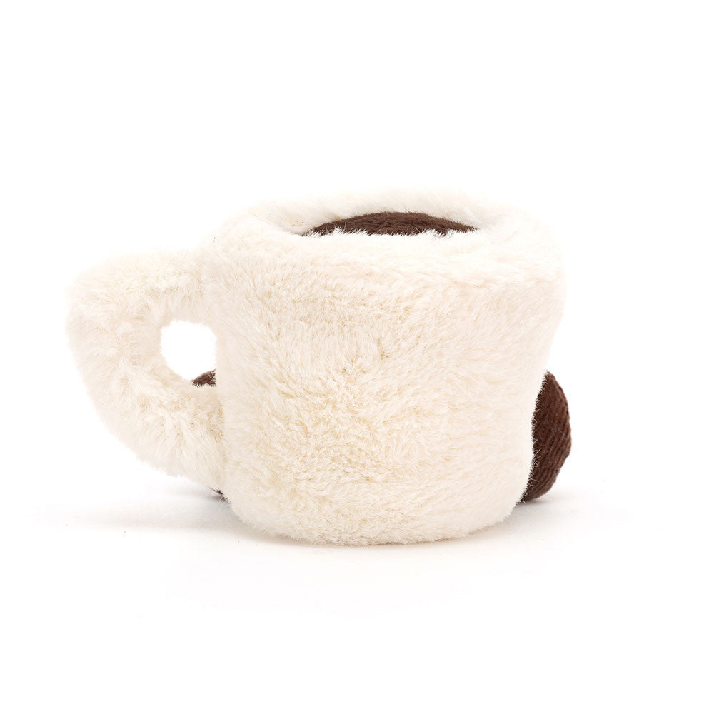 back view of small white espresso coffee cup jellycat stuffed plush toy with black smiley face by jellycat