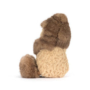 side view of Jellycat peanut dressed as a Yeti on white background
