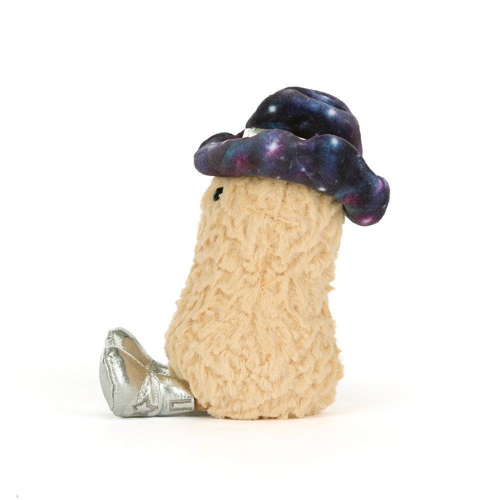 side view of Plush toy smiling peanut with blue galaxy cowboy hat with silver band and silver boots on a white background