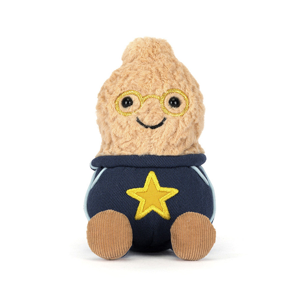 Plush toy resembling a peanut with glasses and a star outfit on a white background