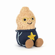 Plush toy peanut with glasses and a star on a navy blue outfit against a white background