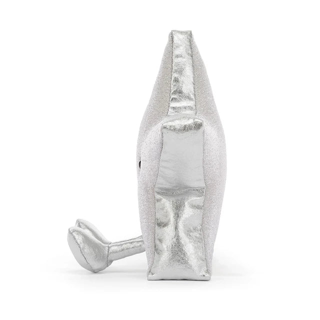 sideview of A silver glittery star-shaped jellycat brand plush toy with a smiling embroidered face and small feet, photographed on a clean white background.