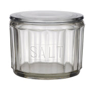 Clear glass jar labeled 'SALT' on a white background
