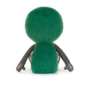back view of green plush fur alien toy with silver black shiny arms at side on a white background