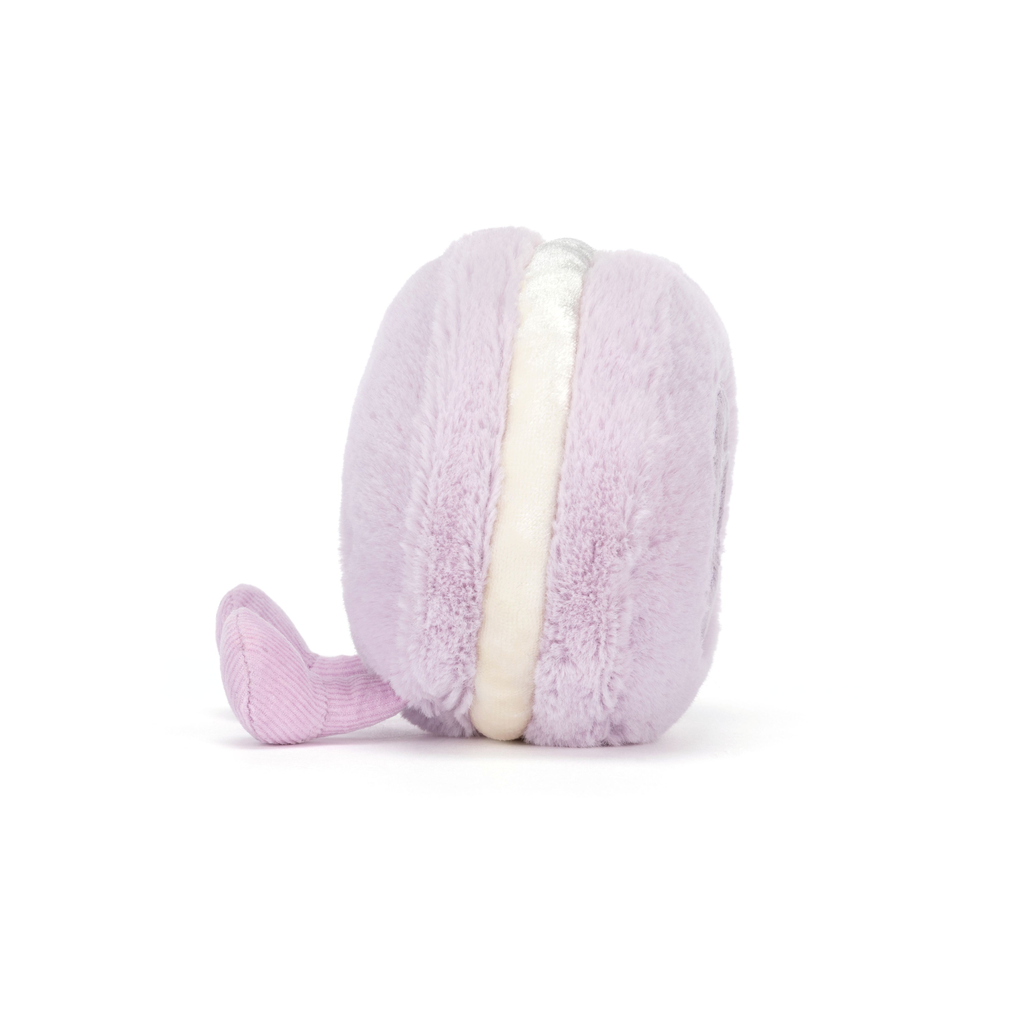 Plush lavender macaron toy on white background
