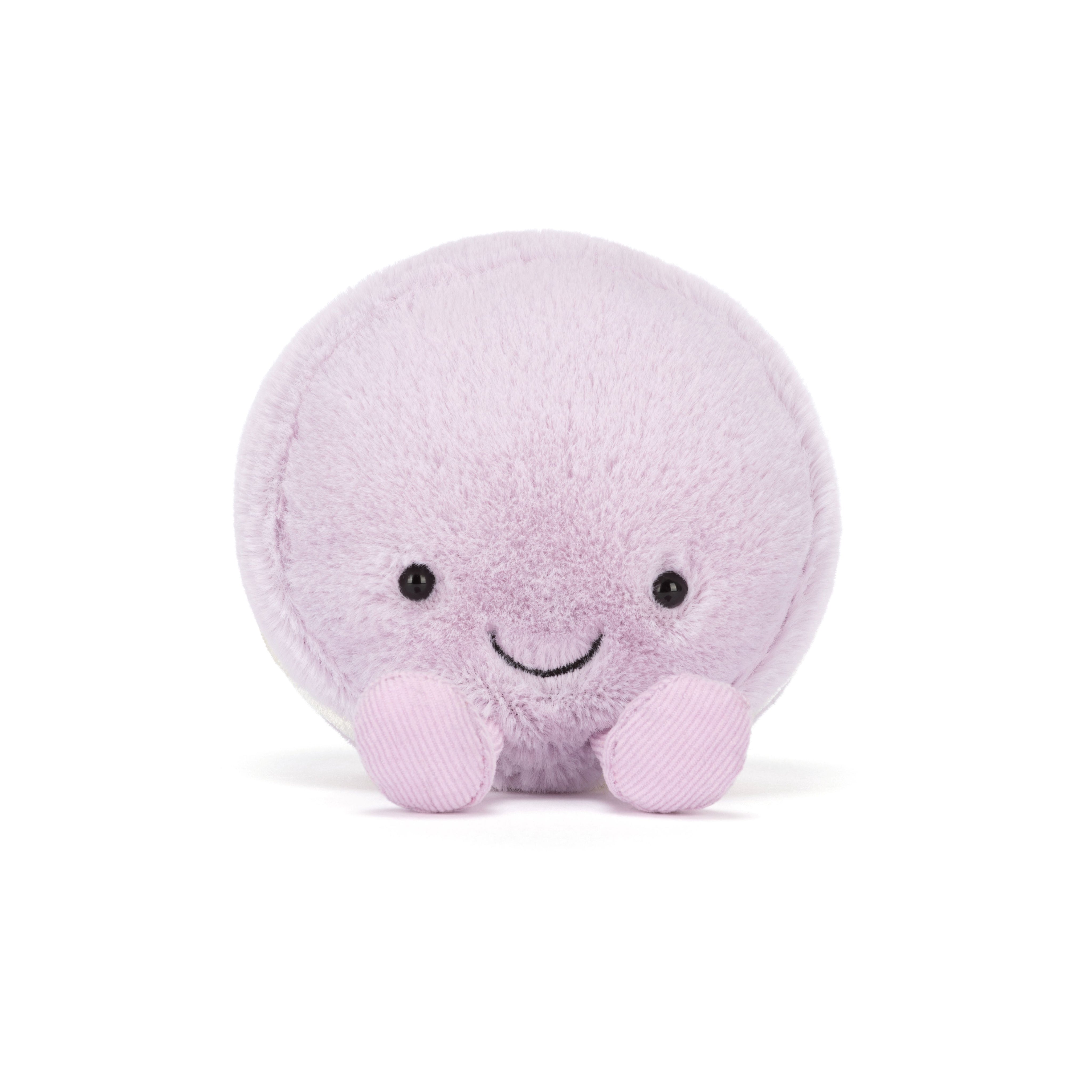 Plush lavender macaron toy on white background