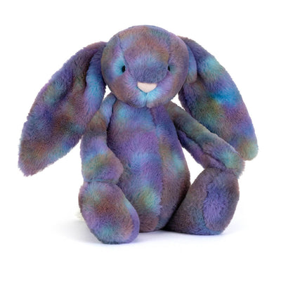 Plush toy bunny with purple galaxy style colouring with long ears and on a white background