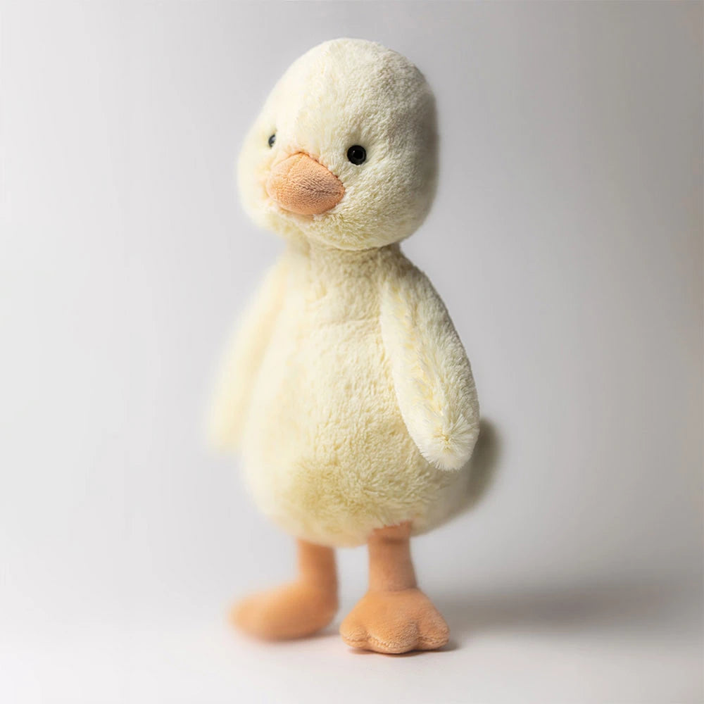 Plush jellycat duck on a white background