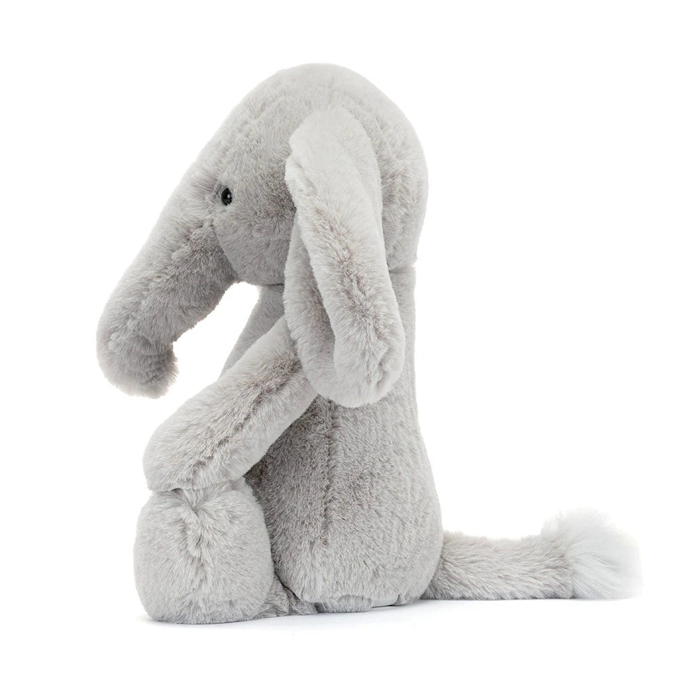 side view of Plush toy elephant from jellycat on a white background