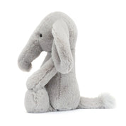 side view of Plush toy elephant from jellycat on a white background