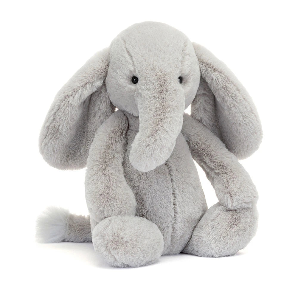 Plush toy elephant from jellycat on a white background