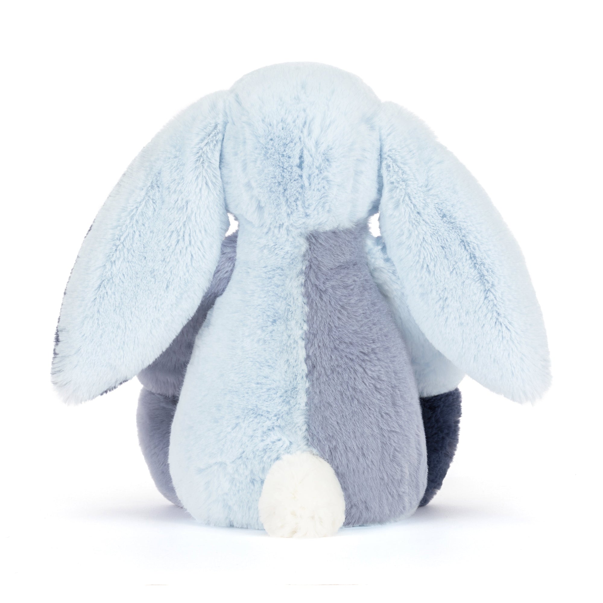 back view of Plush blue patchwork Jellycat rabbit with blue and light blue fur on a white background