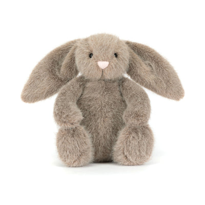 Plush toy grey bunny rabbit on a white background