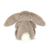 Plush grey bunny rabbit  toy with long ears and white fluffy tail on a white background