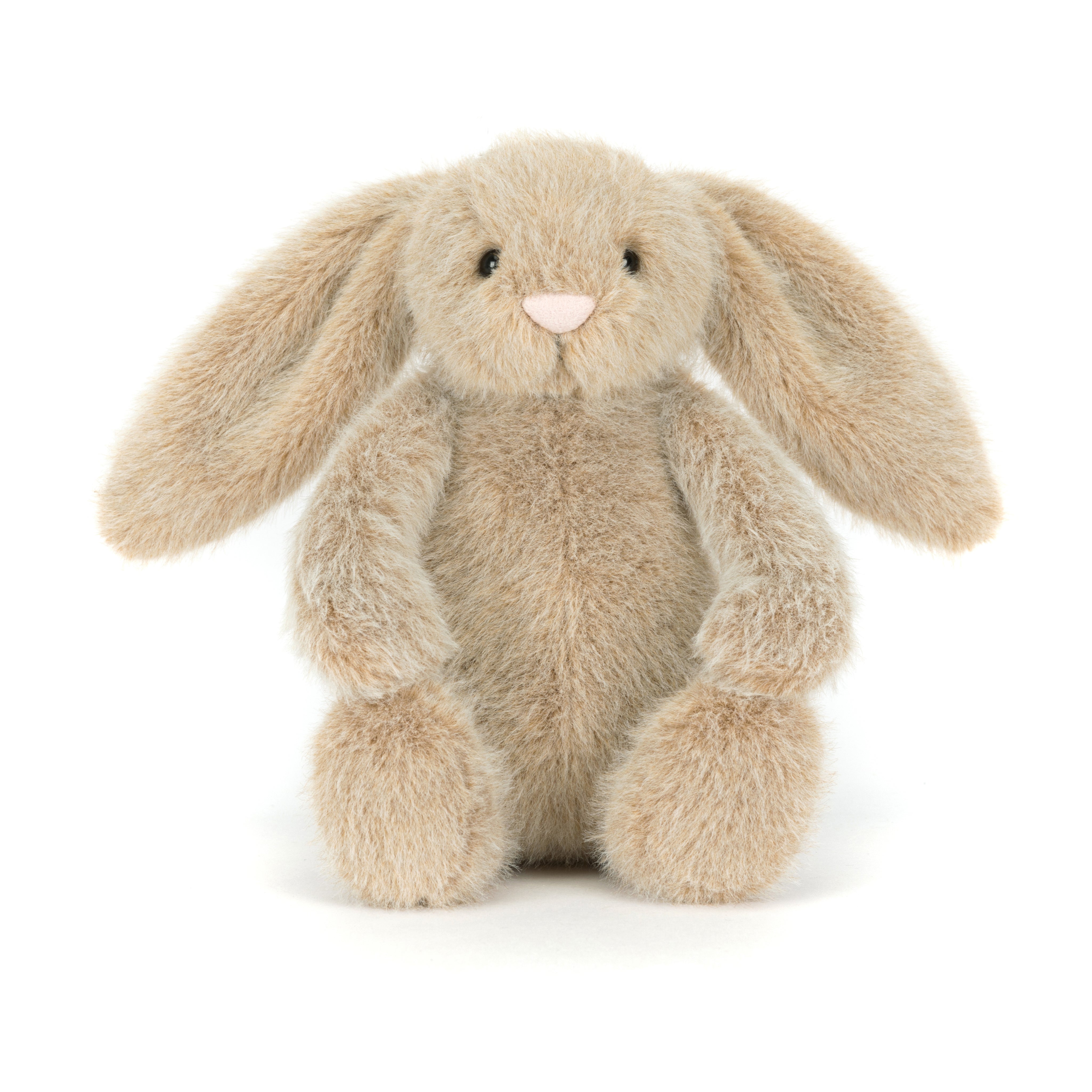Plush beige bunny rabbit toy on a white background