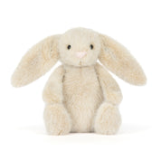 Plush cream bunny rabbit toy on a white background
