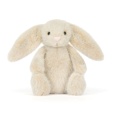 Plush cream bunny rabbit toy on a white background