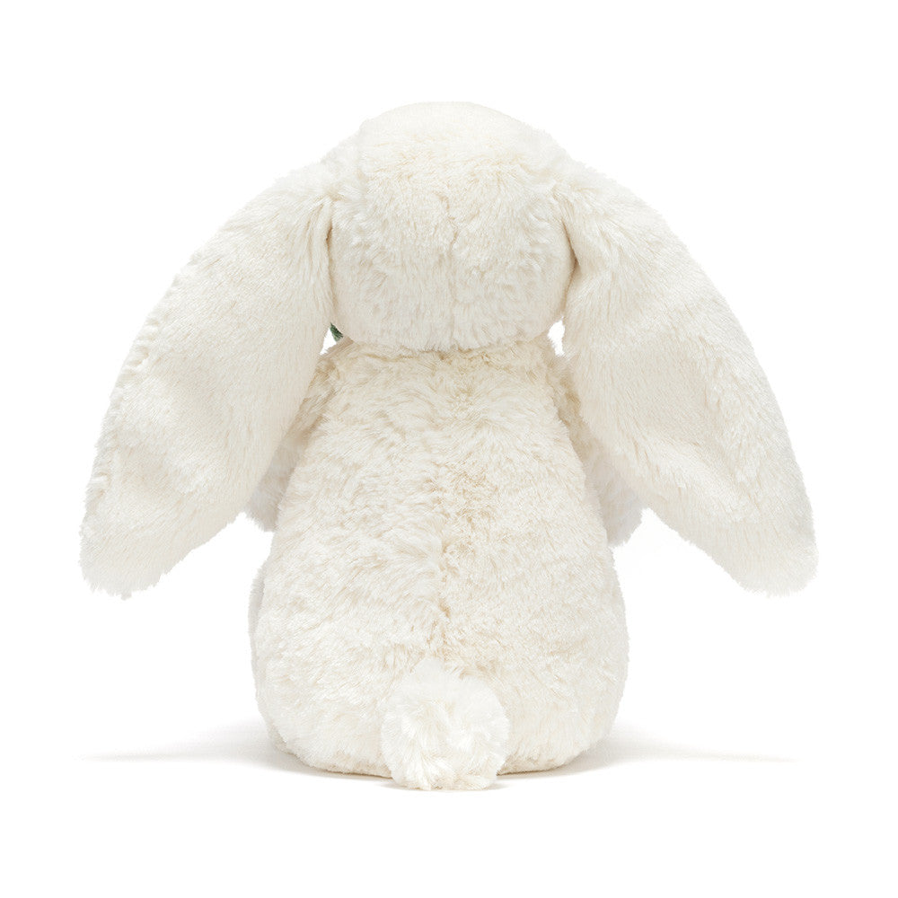 back view of white plush bunny rabbit on white background